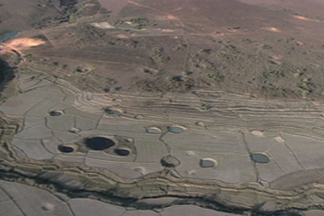 Image of bomb craters left behind from war bombings