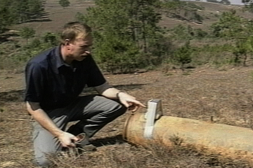 Image of an American looking out for UXO